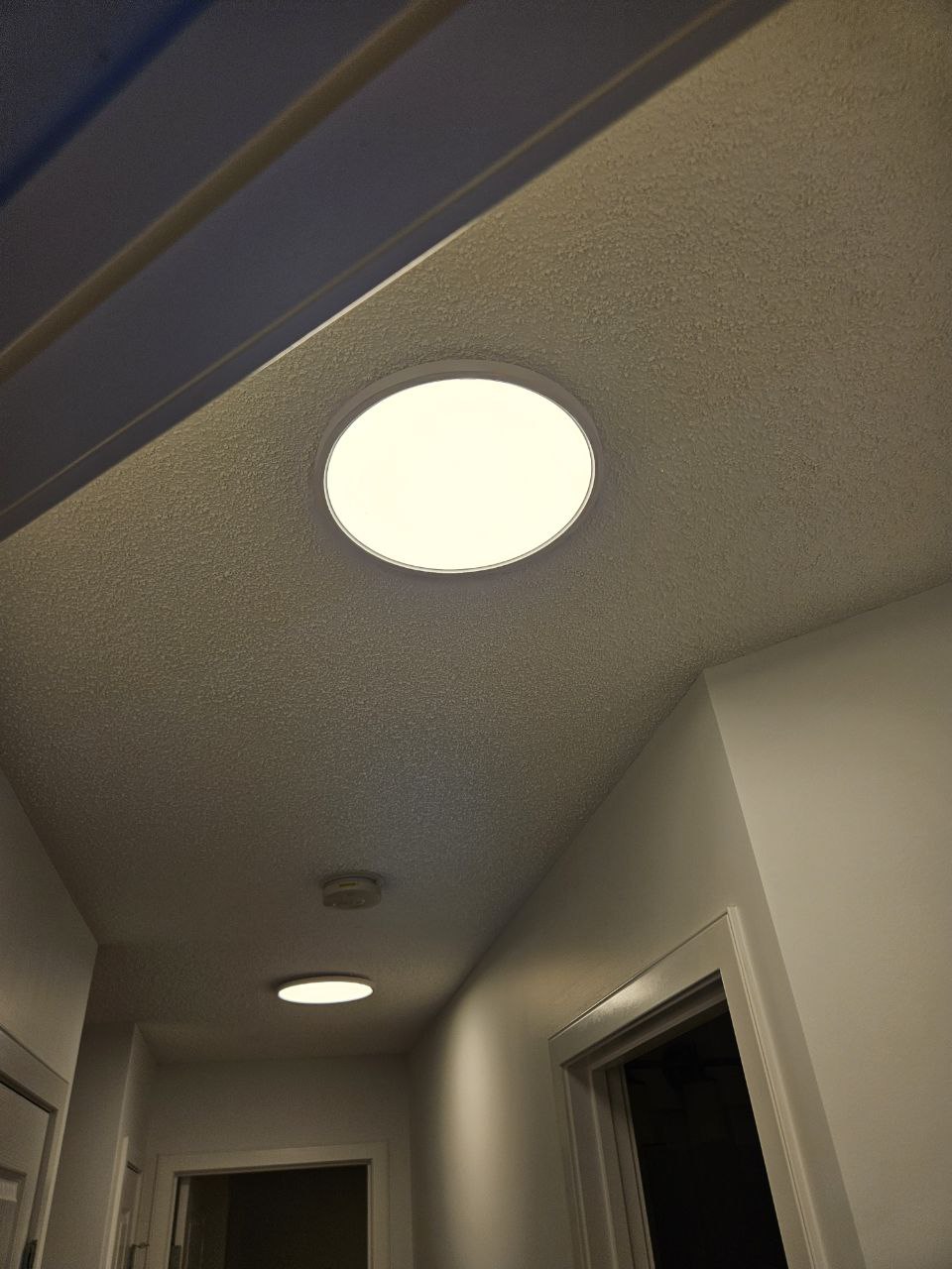 Ceiling light fixture installed in Calgary hallway